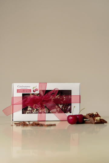 1/2 lb of cherry, coconut, cacao nib bark made with semi-sweet dark chocolate from Colombia.