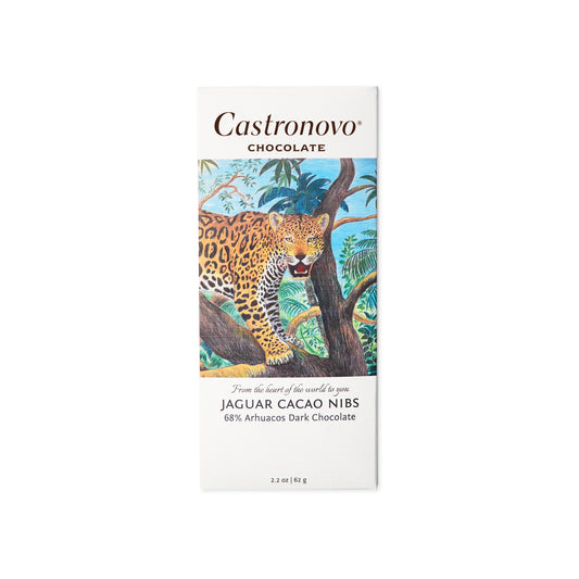Front view of chocolate bar with roasted macambo pieces, image of jaguar on cover